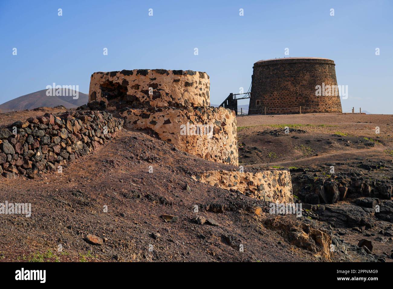 Old lime kilns made out of stone and constituted of a round stepped