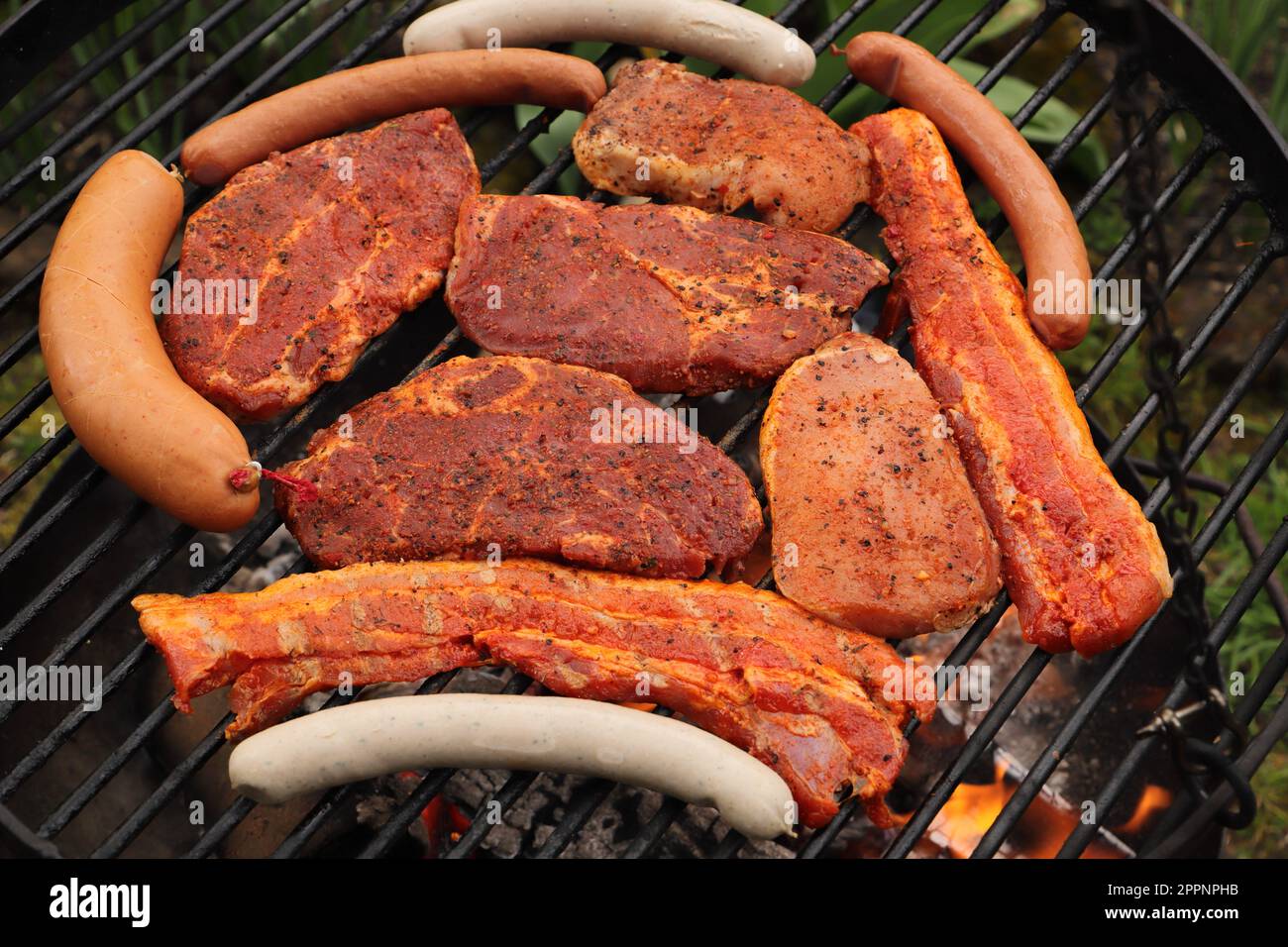 various meat and sausages on the charcoal grill Stock Photo Alamy