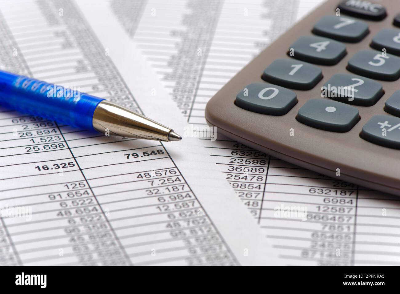 business, finance and economy with chart, calculator and data Stock Photo