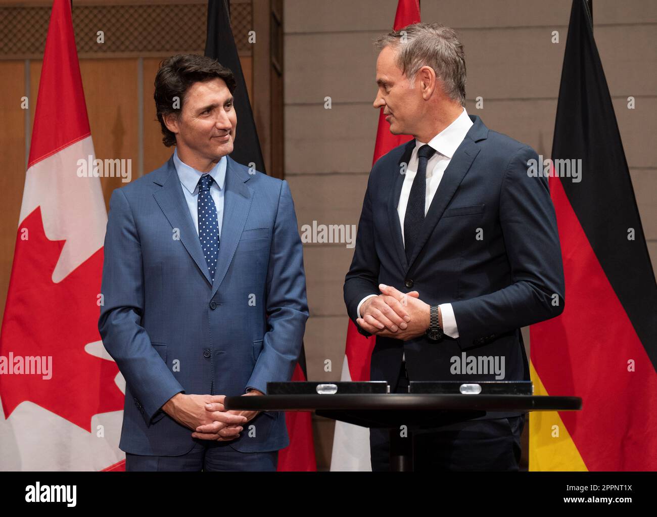 Ottawa, Canada. 24th Apr, 2023. Prime Minister Justin Trudeau speaks with  CEO of Volkswagen Group Oliver Blume before a signing ceremony with German  President Frank-Walter Steinmeier (not seen) on Parliament Hill, Monday,