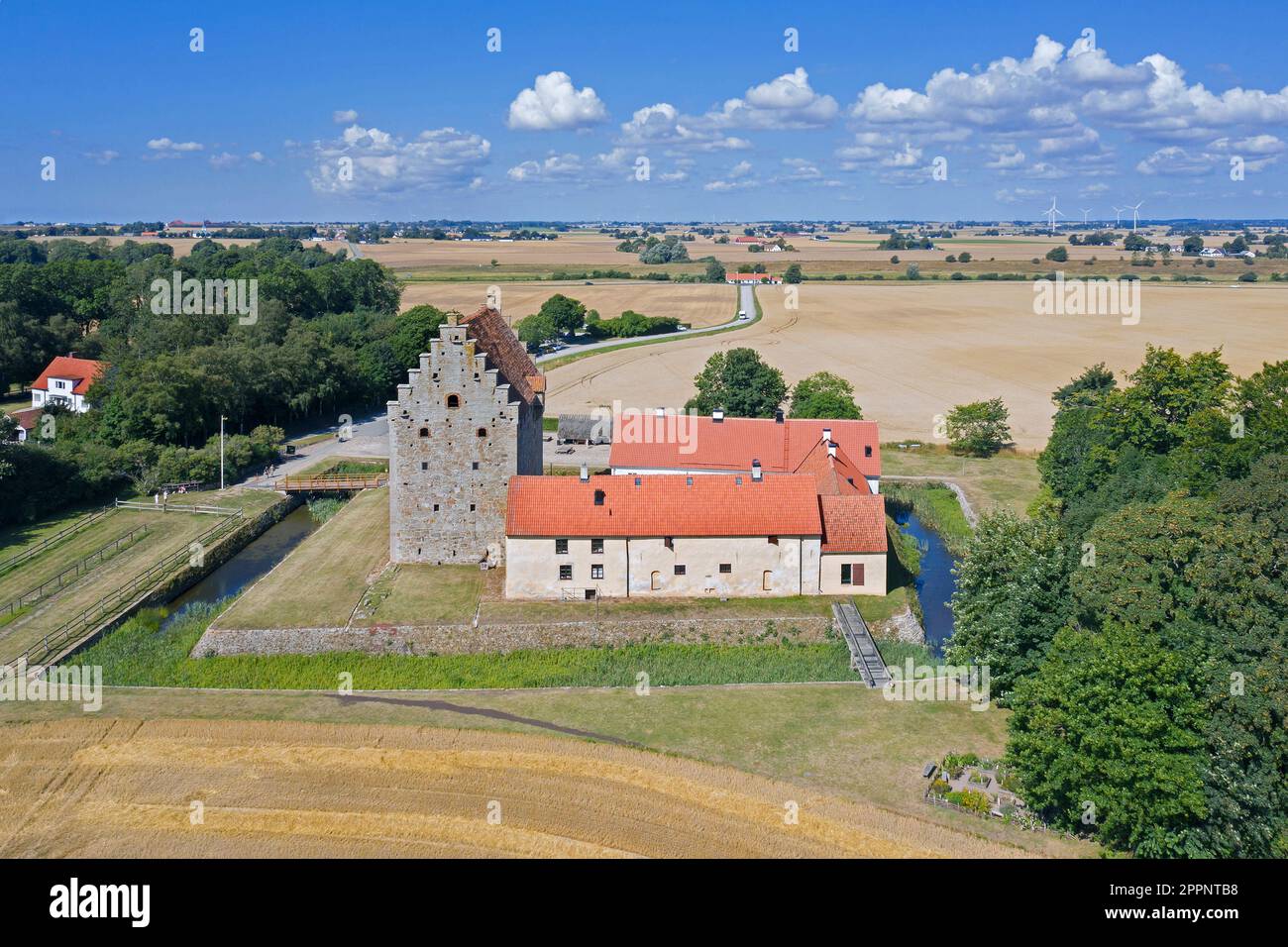 Aerial view over Glimmingehus, medieval castle at Simrishamn Municipality, Scania / Skåne in southern Sweden in summer Stock Photo