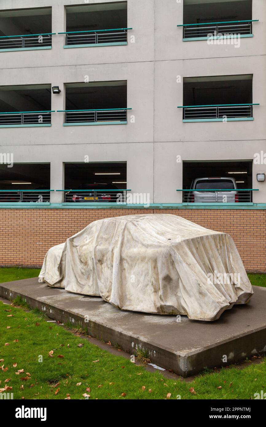 Catalyst Car Sculpture a draped lifesized car that has been cast in