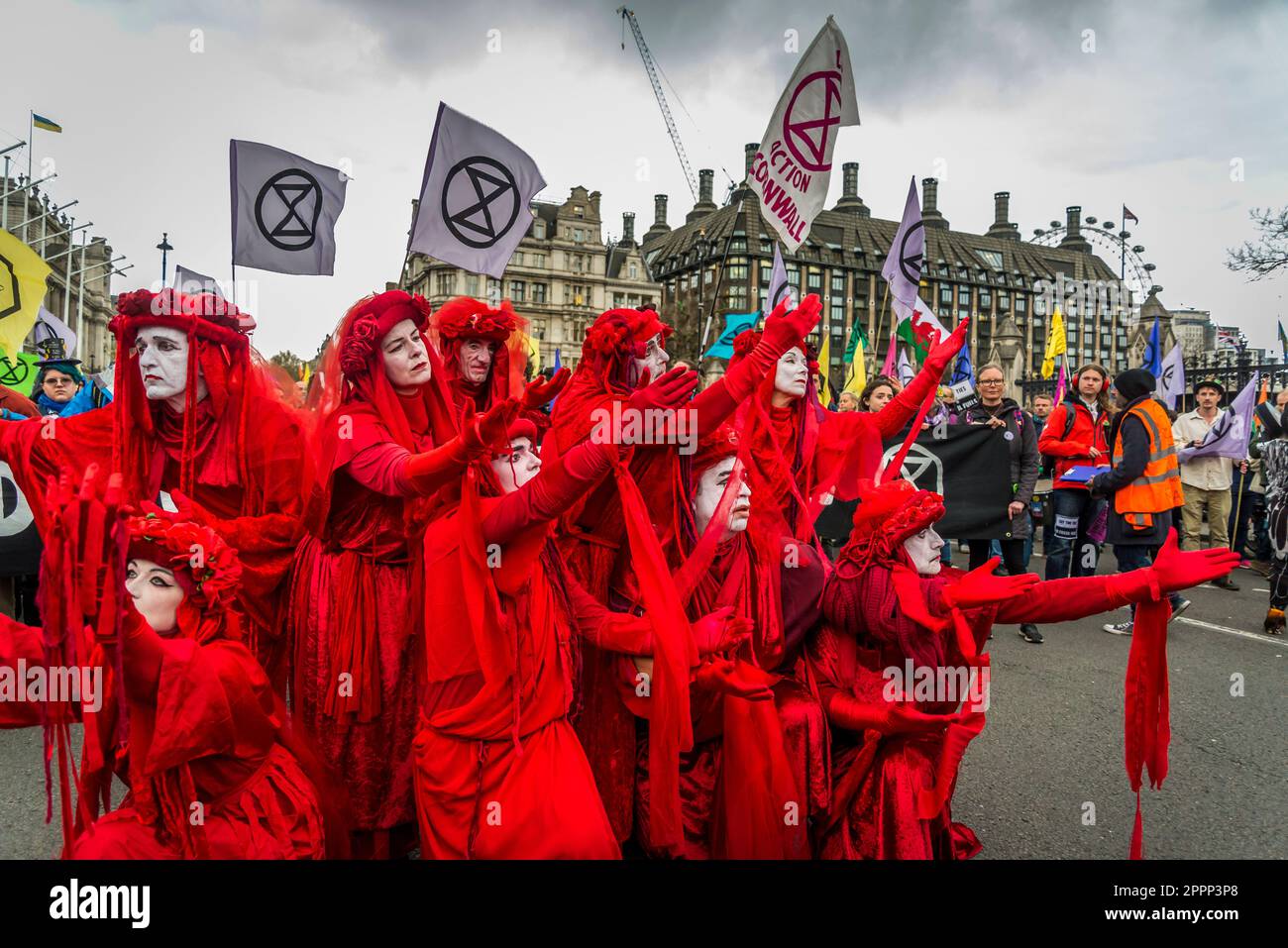 Red Rebels, Extinction Rebellion protest fighting for climate justice, Parliament Square, London, England, UK, 24/04/2023 Stock Photo