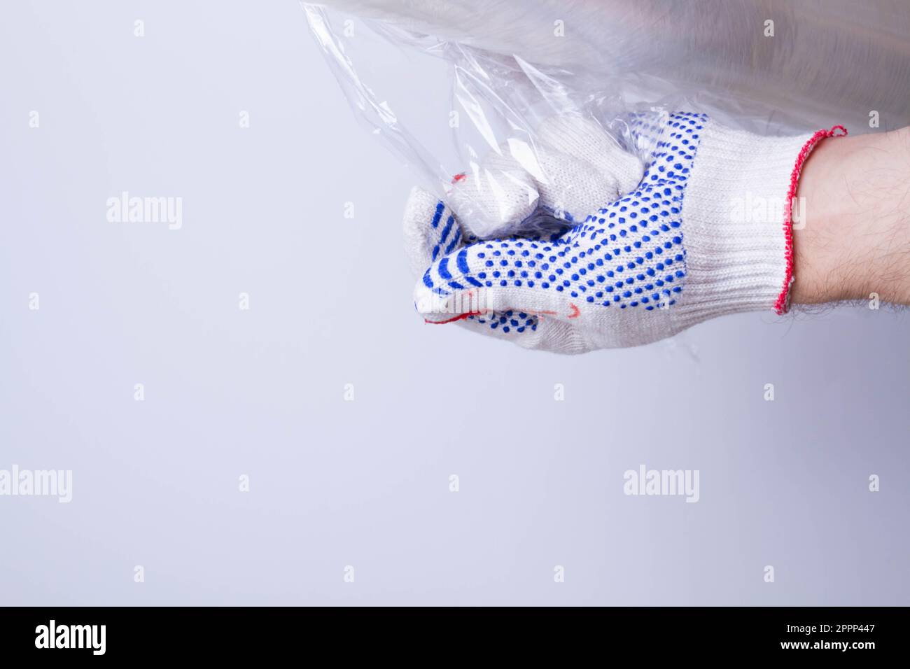 Packing the goods in a cardboard box and stretch film. Tools for