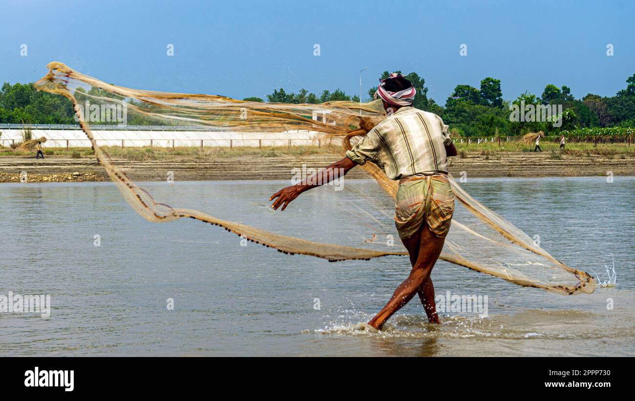 catching fish by hook in bangladesh Catching fish bangladesh hi-res stock photography and images