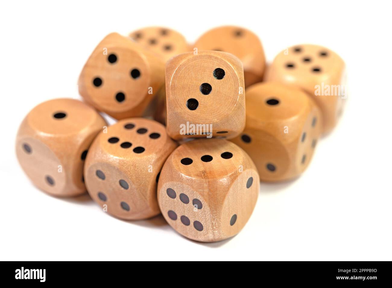 Wooden game cubes against white background Stock Photo