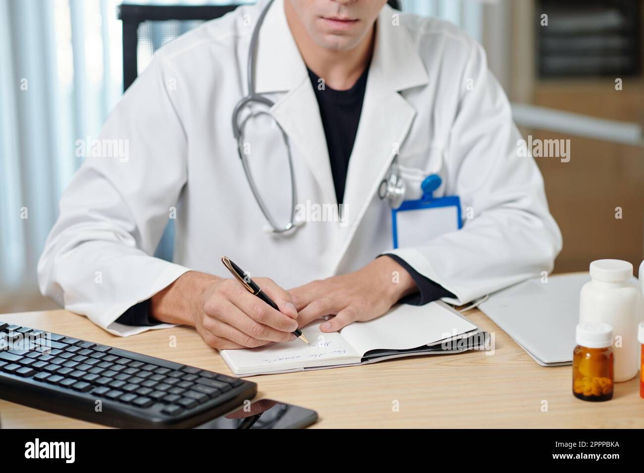 Patient Writing Clinician writing patient notes pen hi-res stock photography and images ...