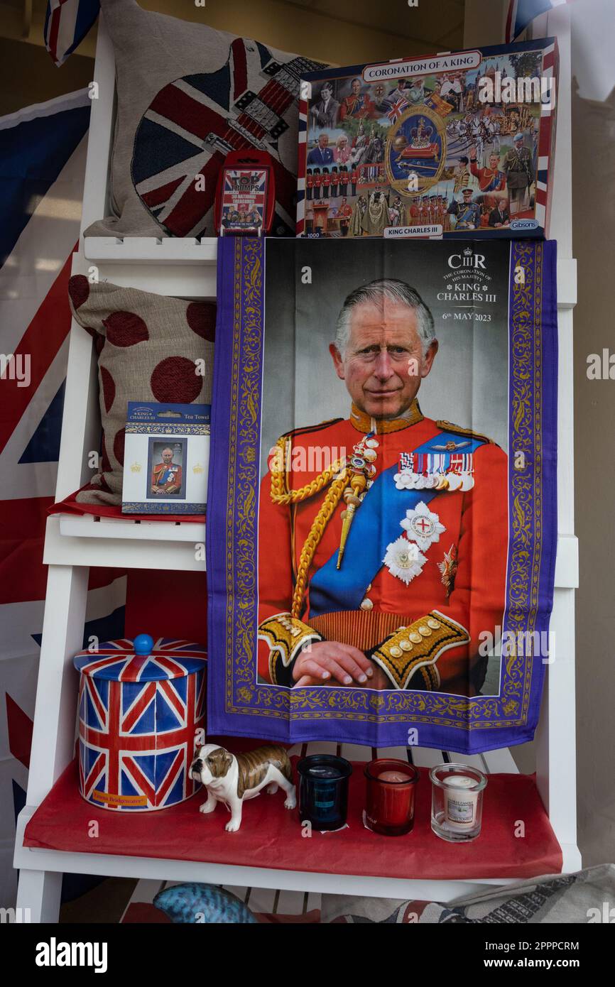 King Charles III coronation souvenirs and merchandise in shop window - Leyburn, North Yorkshire, England, UK Stock Photo