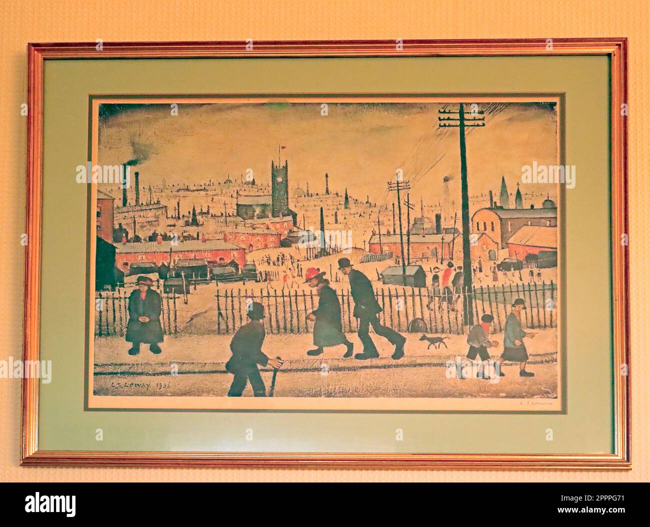 L.S.Lowry framed print  - View of a town - framed and on a wall. Stock Photo