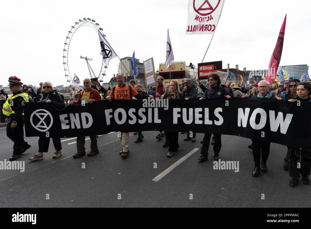 London, UK. 24 April, 2023. Climate activists stage a 'March To End Fossil Fuels', from Parliament Square to the HQ of Shell oil company, on the final day of protests initiated by Extinction Rebellion and supported by more than 200 organisations, including environmental groups, NGO's, and unions. In order to address the climate emergency they are demanding government stop the licencing, funding and approval of new fossil fuel projects, and create 'Citizen Assemblies' to tackle the climate crisis. Credit: Ron Fassbender/Alamy Live News. Stock Photo