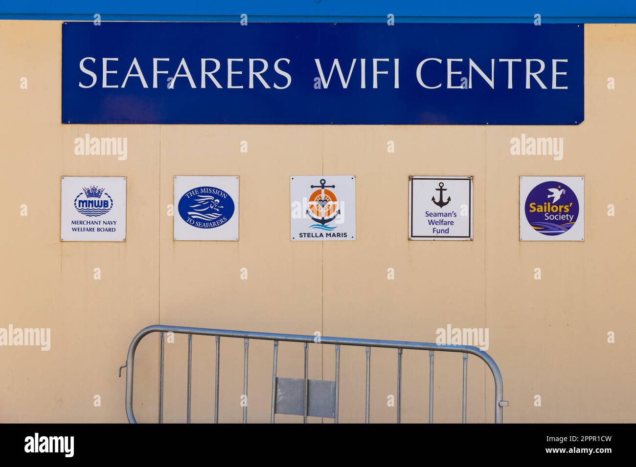 Seafarers wifi centre building with seamens charity signs. North Mole road. Port entrance. The British Overseas Territory of Gibraltar, the Rock of Gi Stock Photo