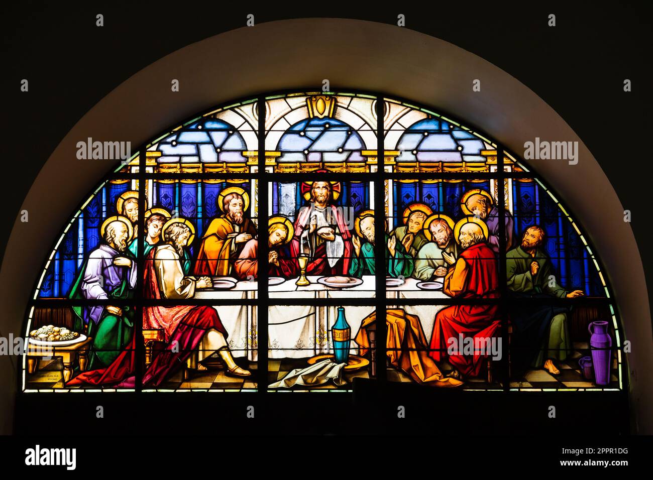 Stained glass window depiction of the Last Supper, The Cathedral of St Mary the Crowned. Catedral de Santa Maria la Coronada. Roman Catholic church, Stock Photo