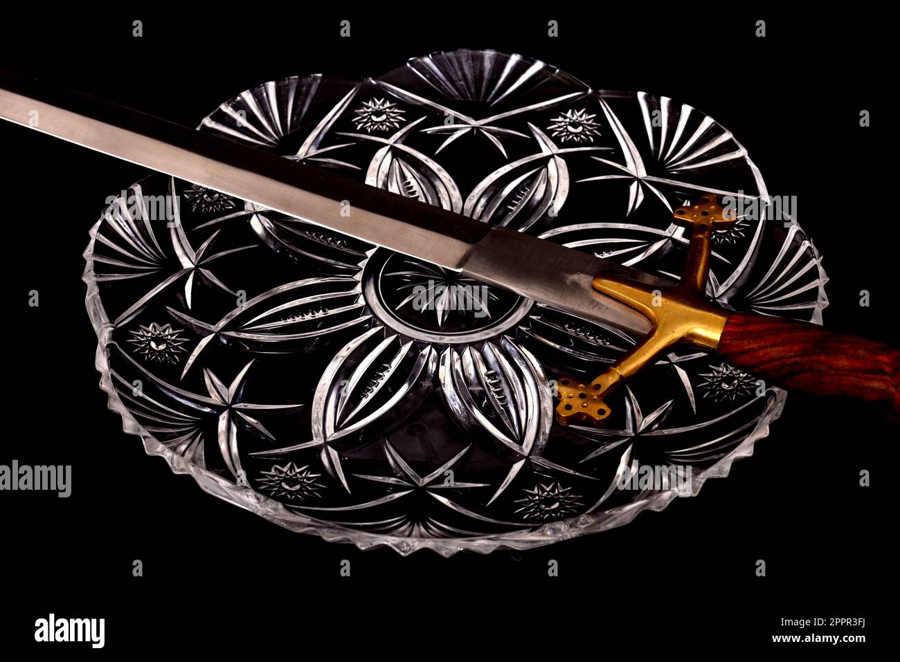 Medieval Sword isolated over a black background Stock Photo