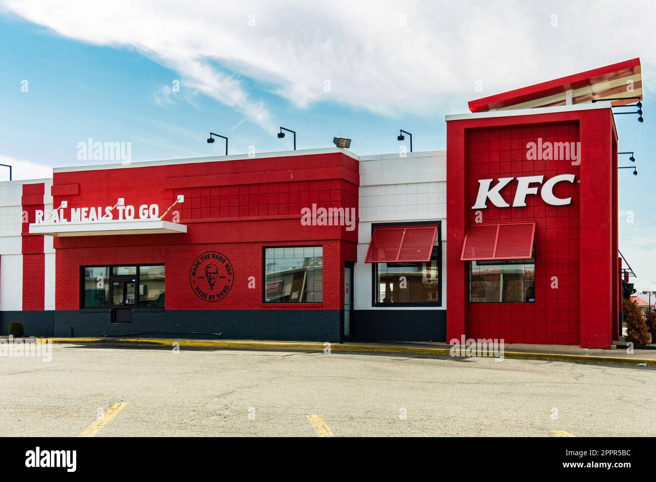 A red painted KFC or Kentucky Fried Chicken exterior building