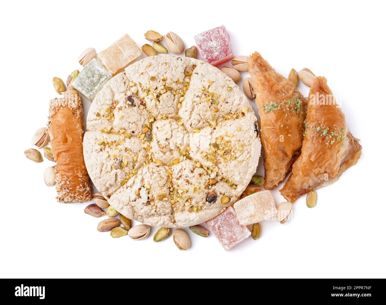 Tasty Tahini halva with pistachios, Turkish delight and baklava on