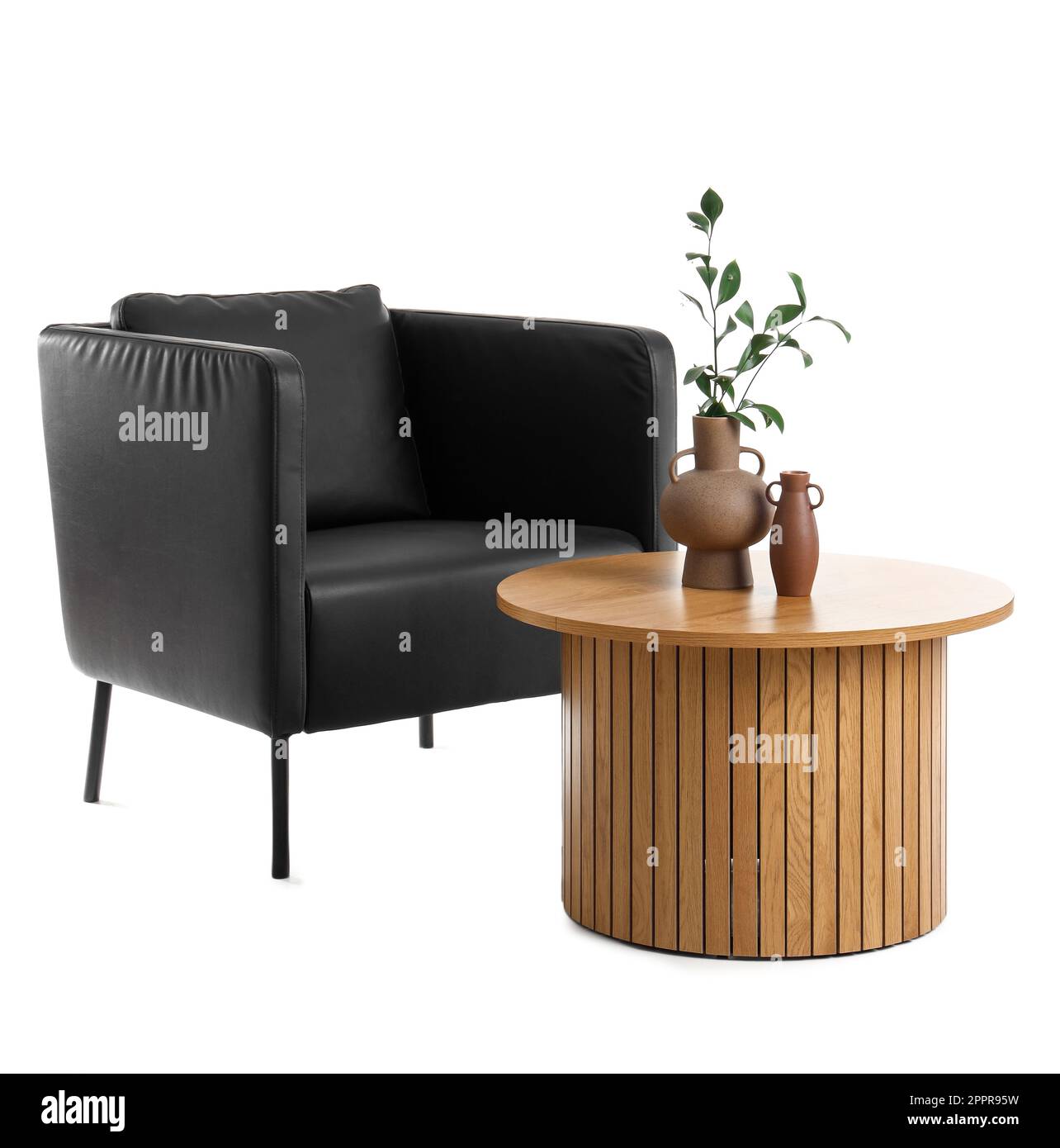 Cozy armchair and coffee table isolated on white background Stock Photo