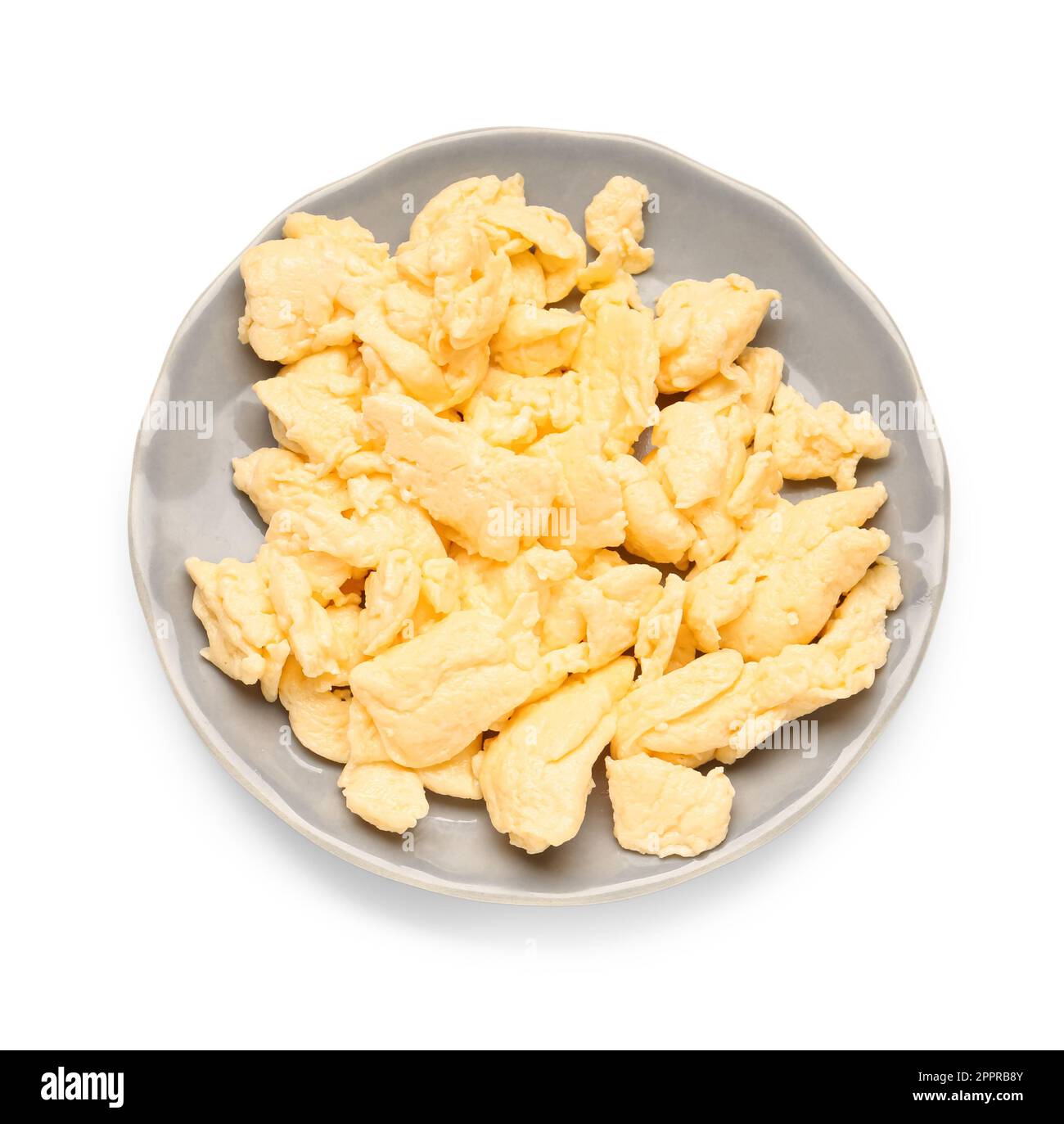 Plate of delicious scrambled eggs isolated on white background Stock ...