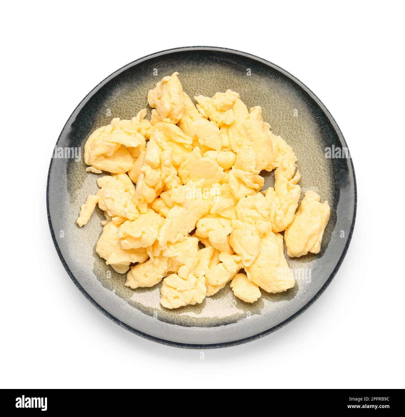Plate of delicious scrambled eggs isolated on white background Stock ...