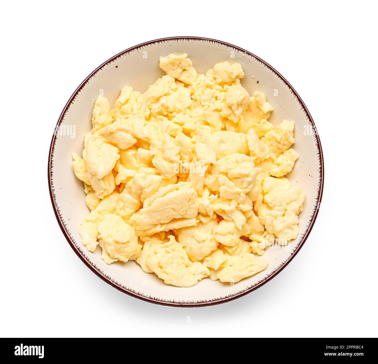Plate of tasty scrambled eggs isolated on white background Stock Photo ...