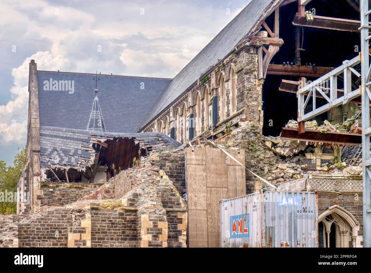 Christchurch, New Zealand - April 5, 2014. Close-up view of the damaged Christ Church Cathedral spire and tower three years post-earthquake. Stock Photo