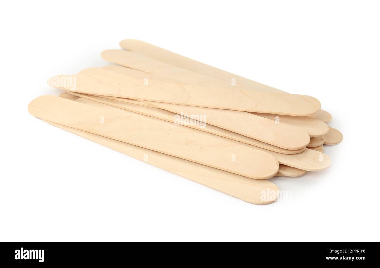 Disposable wooden spatulas for depilatory wax on white background Stock