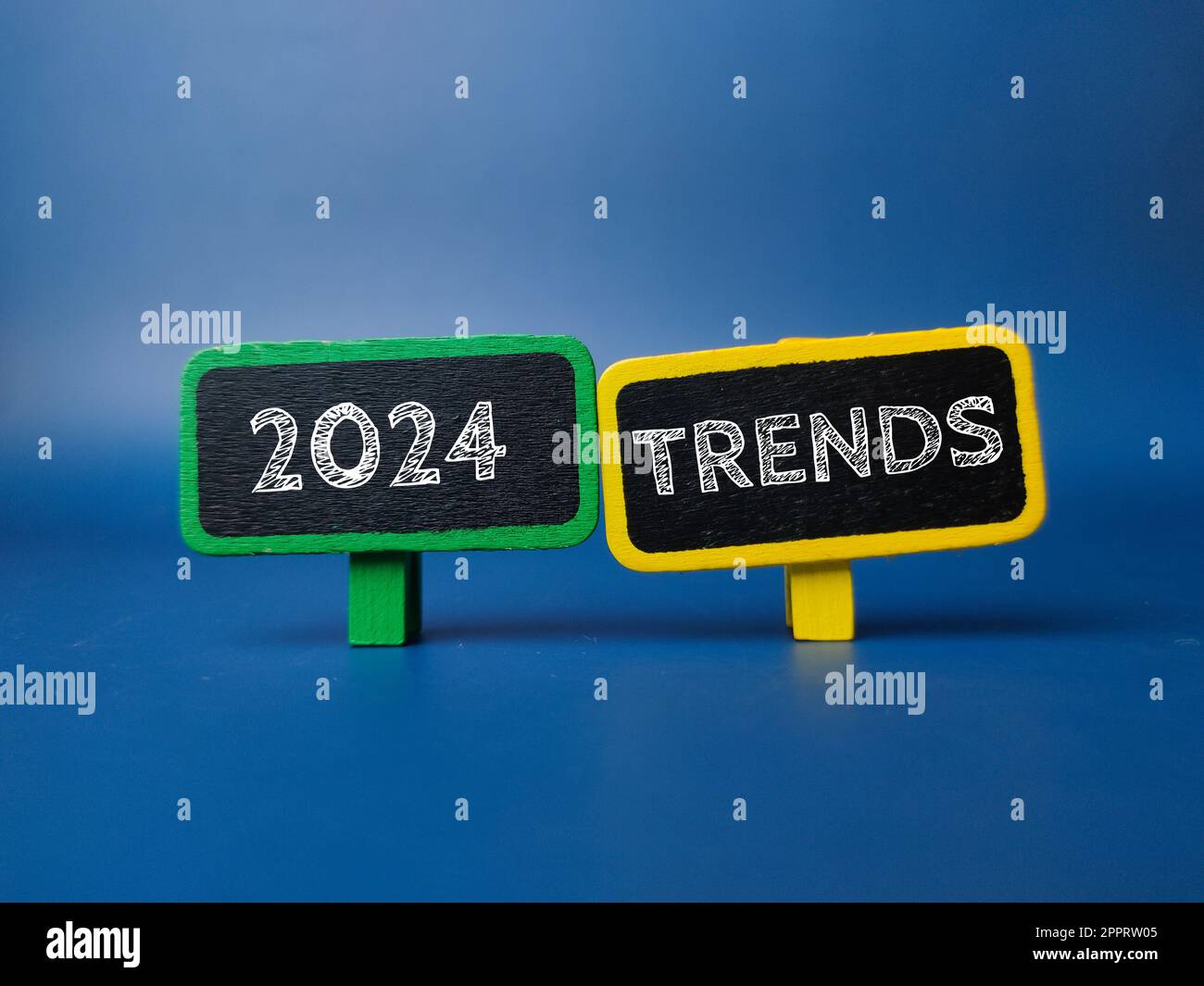 Colored board with the word 2024 TRENDS on blue background Stock Photo