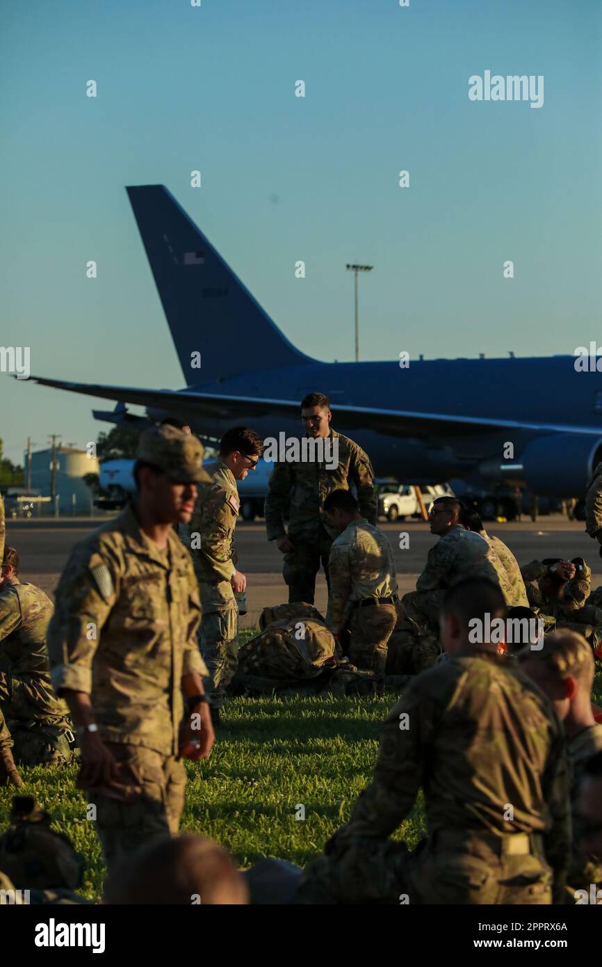 Paratroopers assigned to 3rd Brigade Combat Team, 82nd Airborne Division, prepare their gear before boarding a Boeing C-17 Globemaster III aircraft at the Joint Readiness Training Center on Fort Polk, La., April 22, 2023. The Paratroopers organize their gear in preparation of the airborne operation as a part of JRTC rotation 23-07. More than 4,000 3rd BCT Paratroopers will participate in the rotation, validating their preparedness for potential upcoming missions (U.S. Army photo by Spc. Lilliana Magoon) Stock Photo