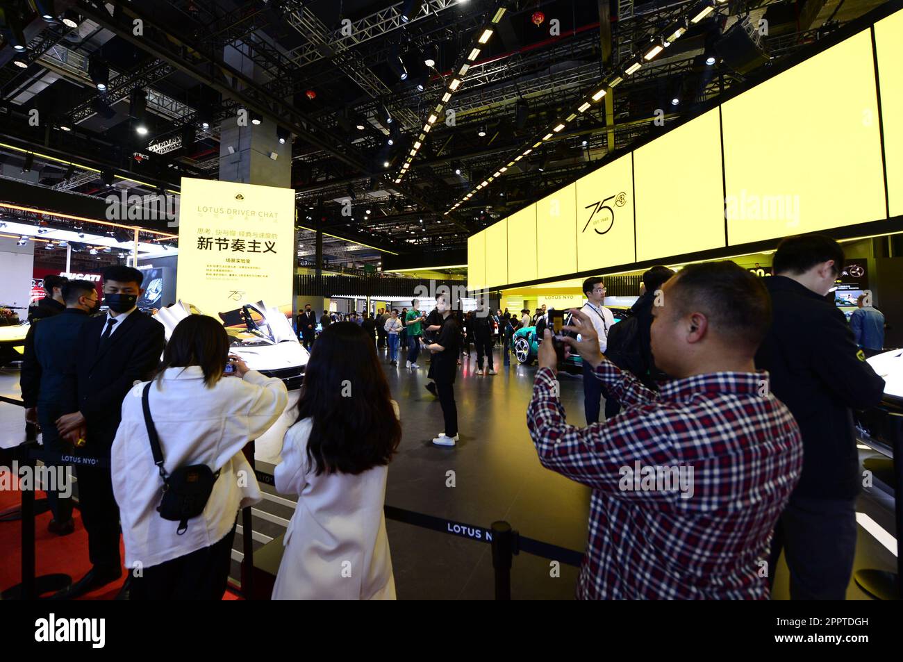 SHANGHAI, CHINA APRIL 21, 2023 Visitors gather at the LOTUS booth