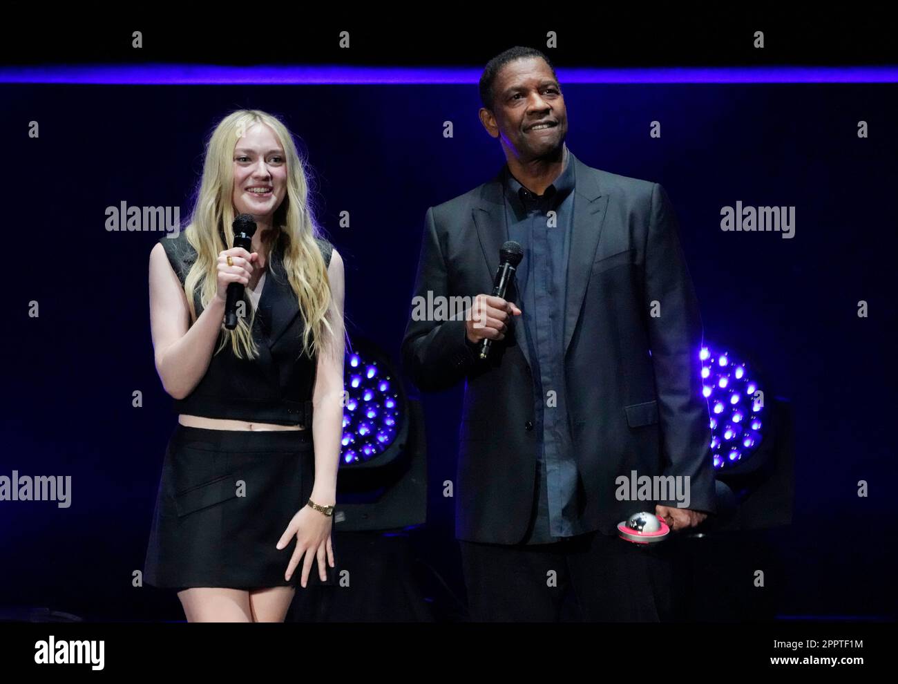 Dakota Fanning, left, and Denzel Washington, cast members in the