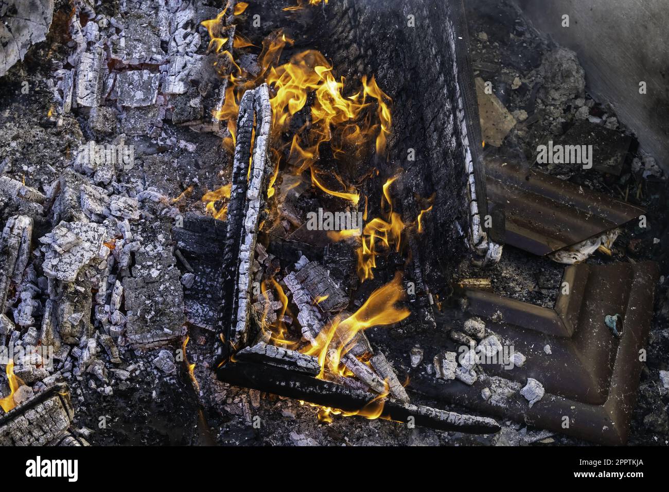 Detail of wood burning with fire and flames, destruction Stock Photo