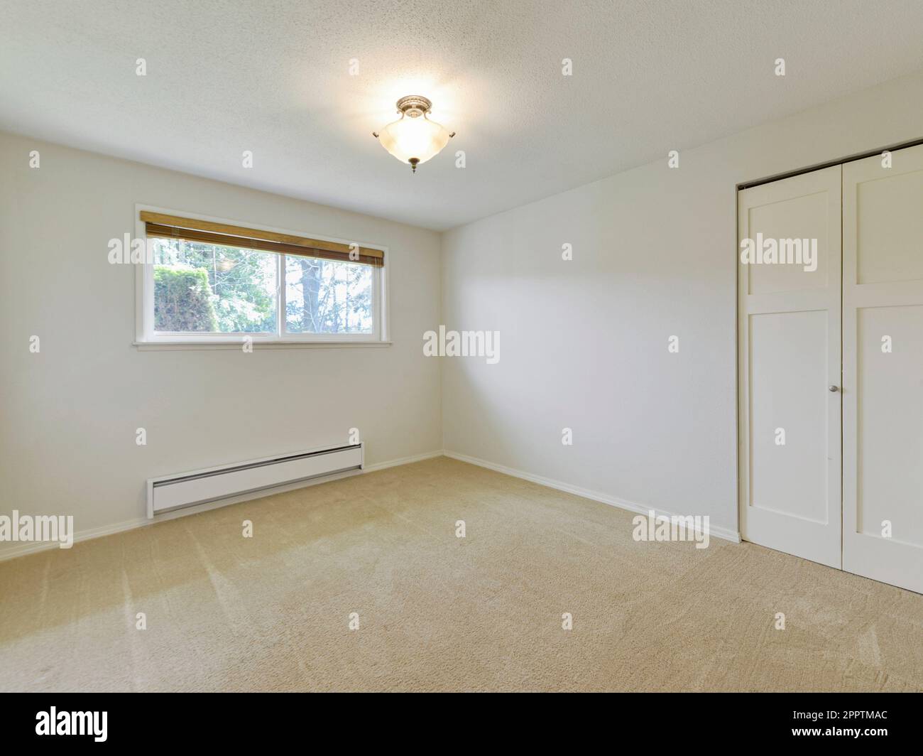 Modern residentail empty bedroom interior Stock Photo - Alamy