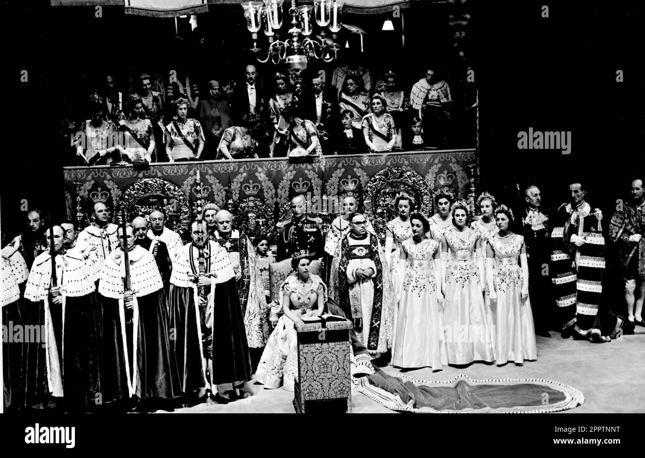 File photo dated 02/06/53 of Prince Charles, standing between the Queen Mother and Princess Margaret, disappearing for a moment behind the canopied stand. The 1953 coronation was a morale boost in the tough post-war years as millions celebrated the historic day. Elizabeth II was crowned in a deeply religious ceremony in Westminster Abbey on June 2 1953. Issue date: Tuesday April 25, 2023. Stock Photo
