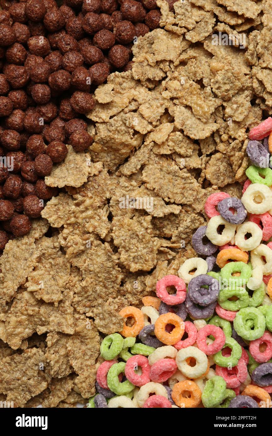 Different types of dry breakfast as background, top view Stock Photo
