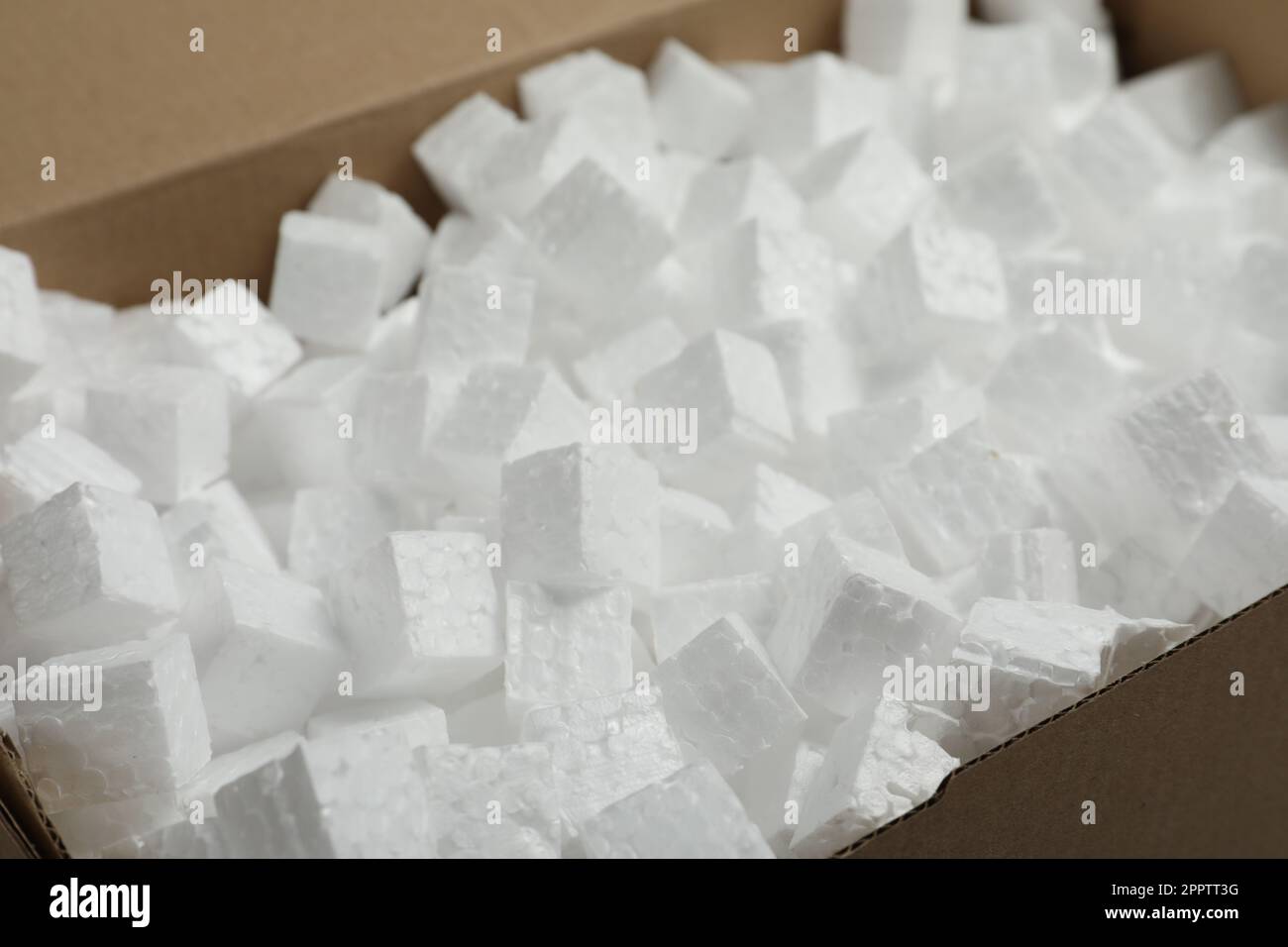 Closeup view of cardboard box with styrofoam cubes Stock Photo Alamy