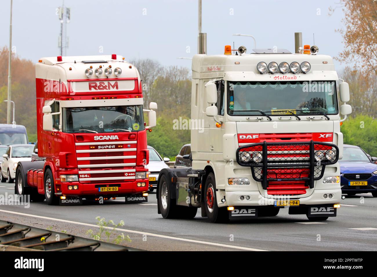 Retro trucks participate in a Retro Truck Tour through South Holland in