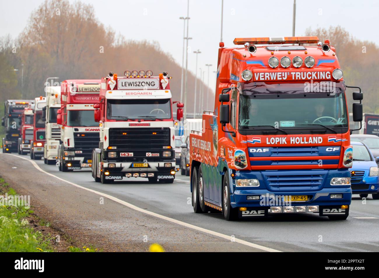 Retro trucks participate in a Retro Truck Tour through South Holland in