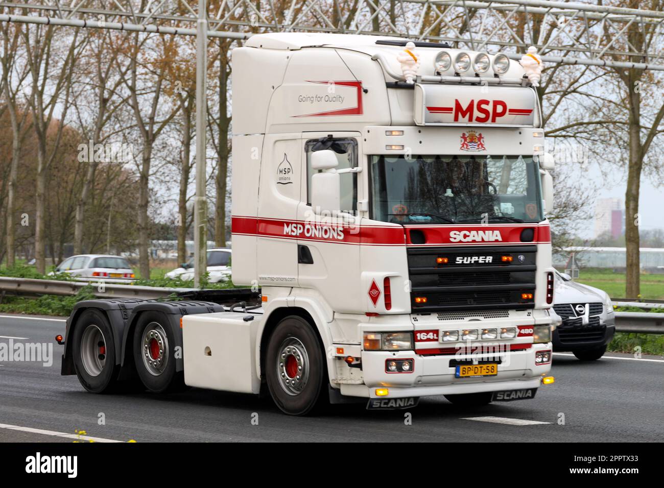 Retro trucks participate in a Retro Truck Tour through South Holland in