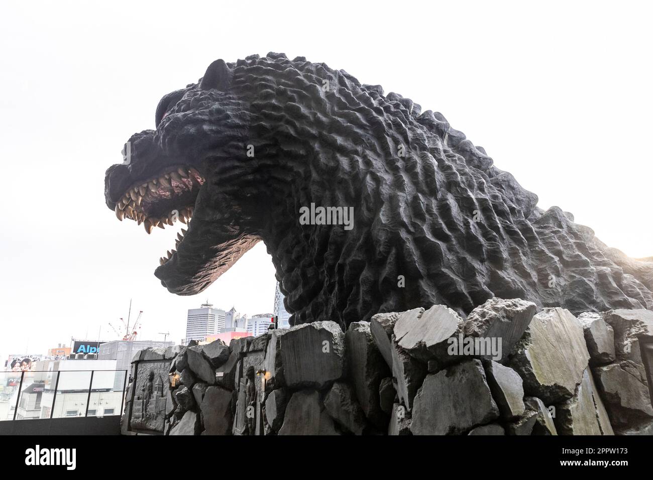 Godzilla, April 2023, close up of Godzilla statue head on the 8th floor of Hotel Gracery in
