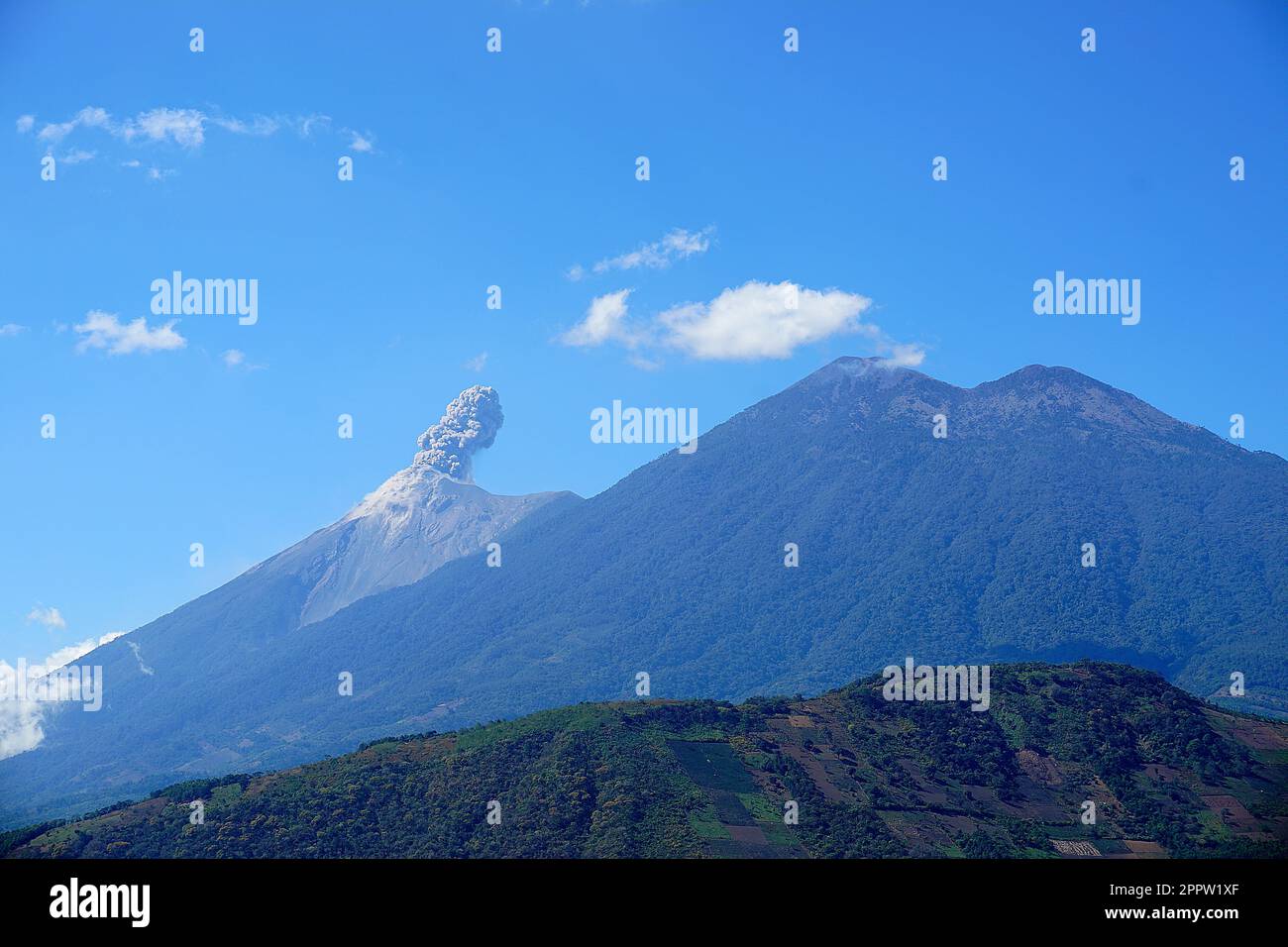 Acatenango and Fuego volcanos under the blue sunny sky seen from San