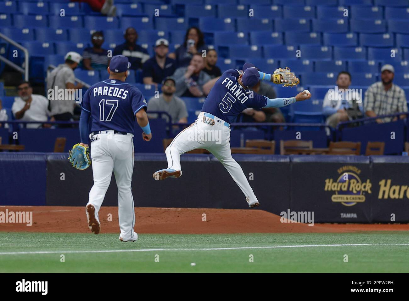 St. Petersburg, FL USA; Tampa Bay Rays shortstop Wander Franco (5) chases  down a ball and makes an amazing barehanded catch during an MLB game  against Stock Photo - Alamy