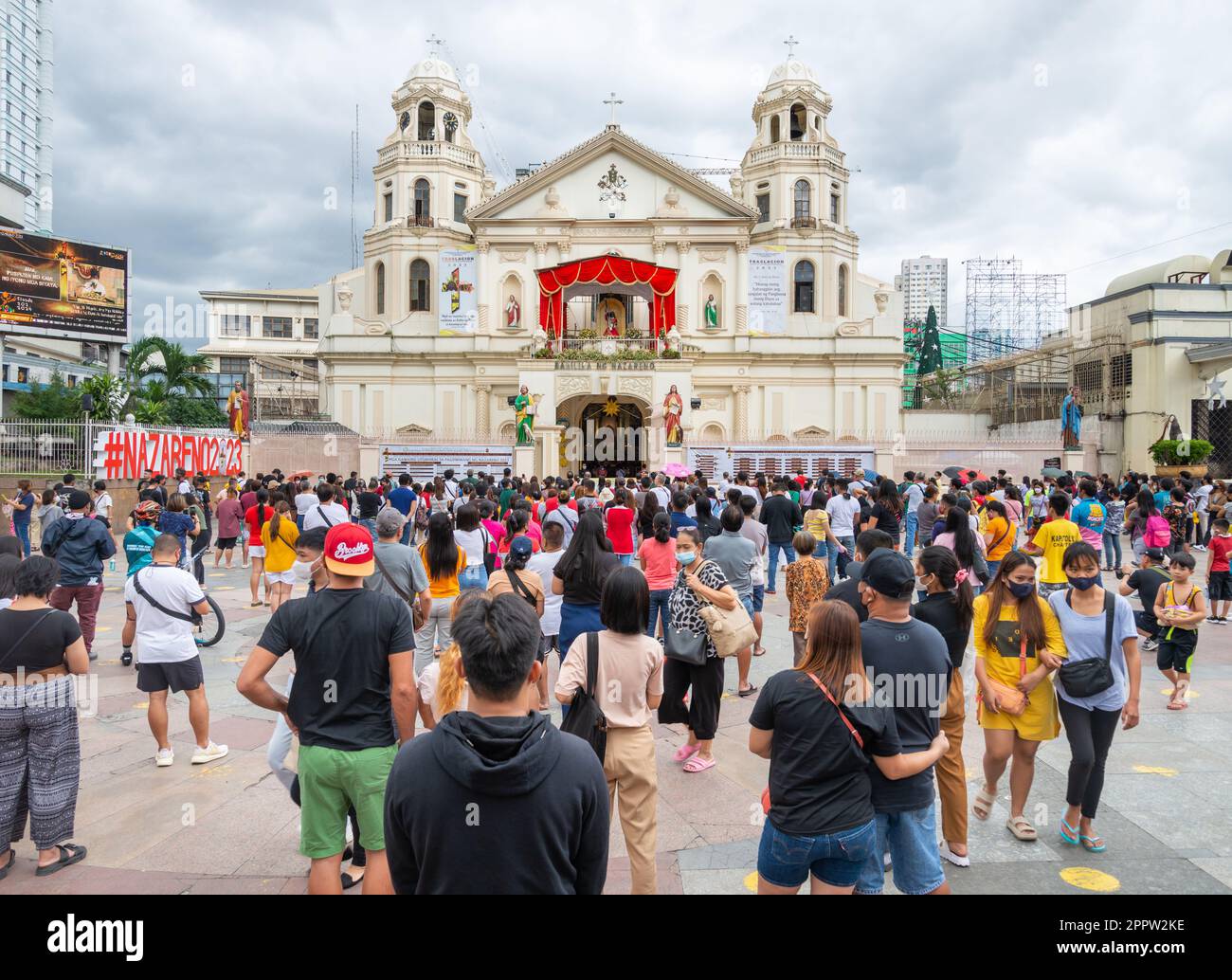 Manila,The Philippines-Jan 07 2023: People gather for prayers outside Quiapo Church,the day before the procession walk,to commemorate the Feast of the Stock Photo