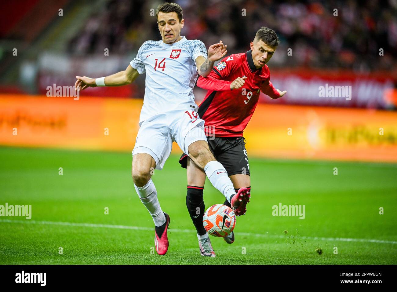 WARSAW, POLAND - MARCH 27, 2023: European qualifiers EURO 2024 gropu stage Poland - Albania o/p: Jakub Kiwior (poland) Jasir Asani (Albania) Stock Photo
