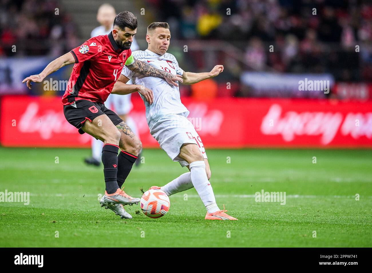 WARSAW, POLAND - MARCH 27, 2023: European qualifiers EURO 2024 gropu stage Poland - Albania o/p: Elseid Hysaj (Albania) Przemyslaw Frankowski (poland) Stock Photo