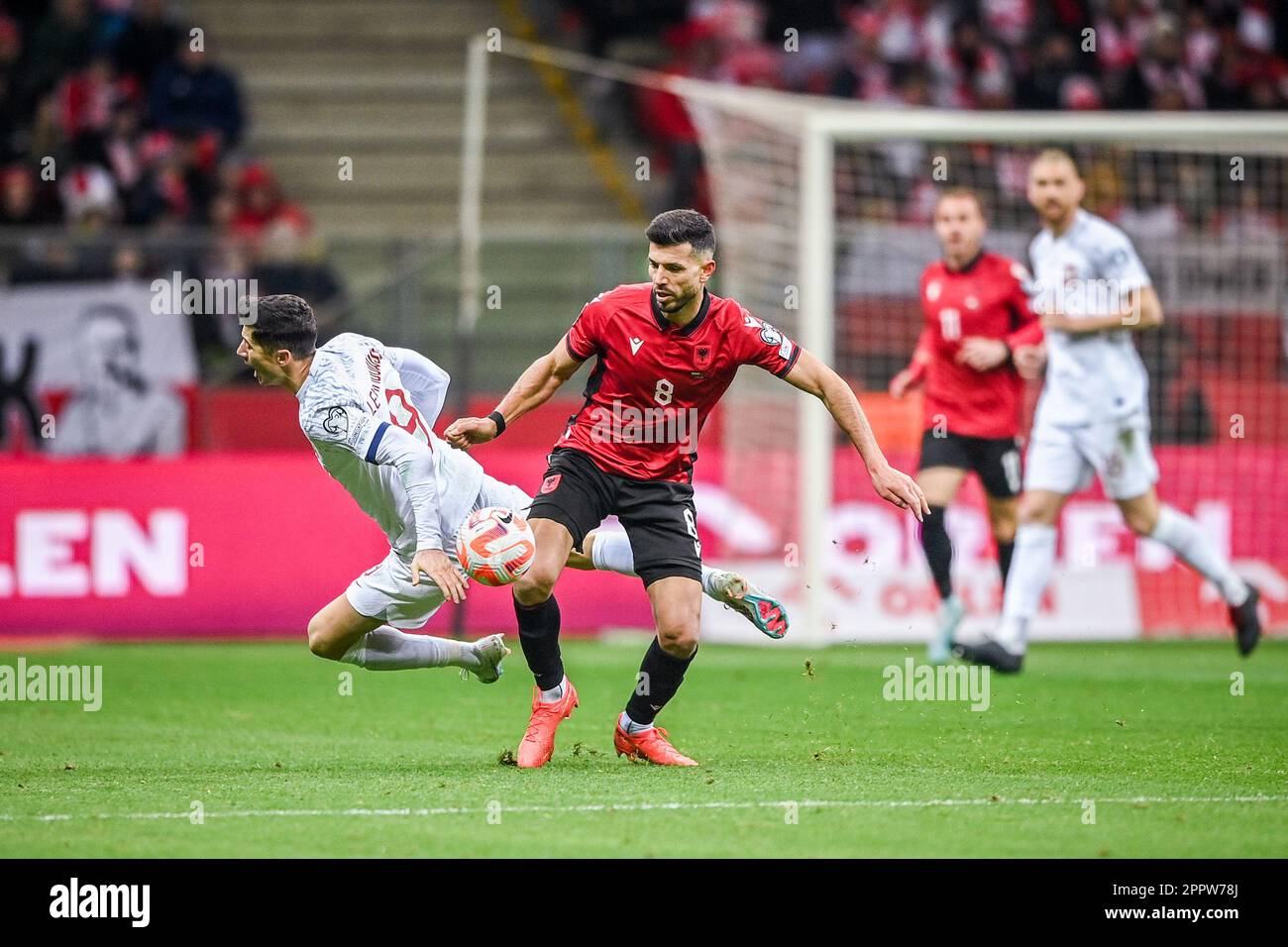 WARSAW, POLAND - MARCH 27, 2023: European qualifiers EURO 2024 gropu stage Poland - Albania o/p: Robert Lewandowski (poland) Klaus Gjasula (Albania) Stock Photo