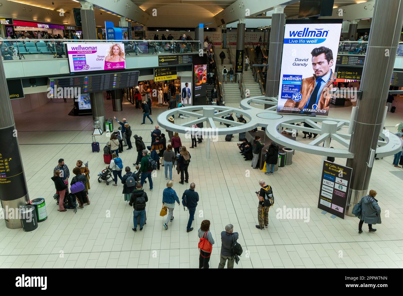 Passengers in central concourse in departures area, South Terminal