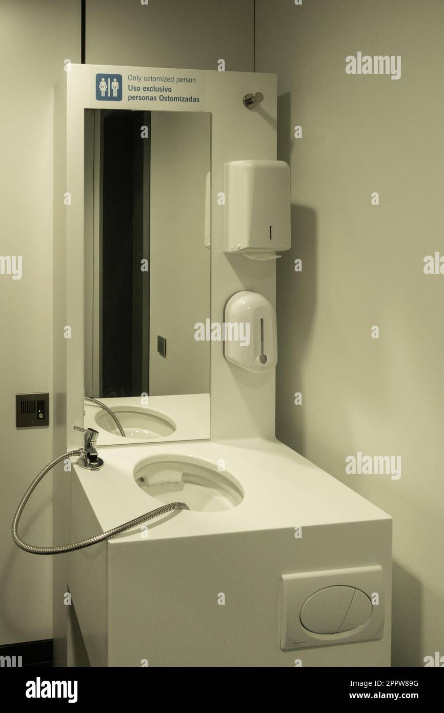 Airport terminal toilet designed exclusively for people with ileostomy or colostomy. Stock Photo