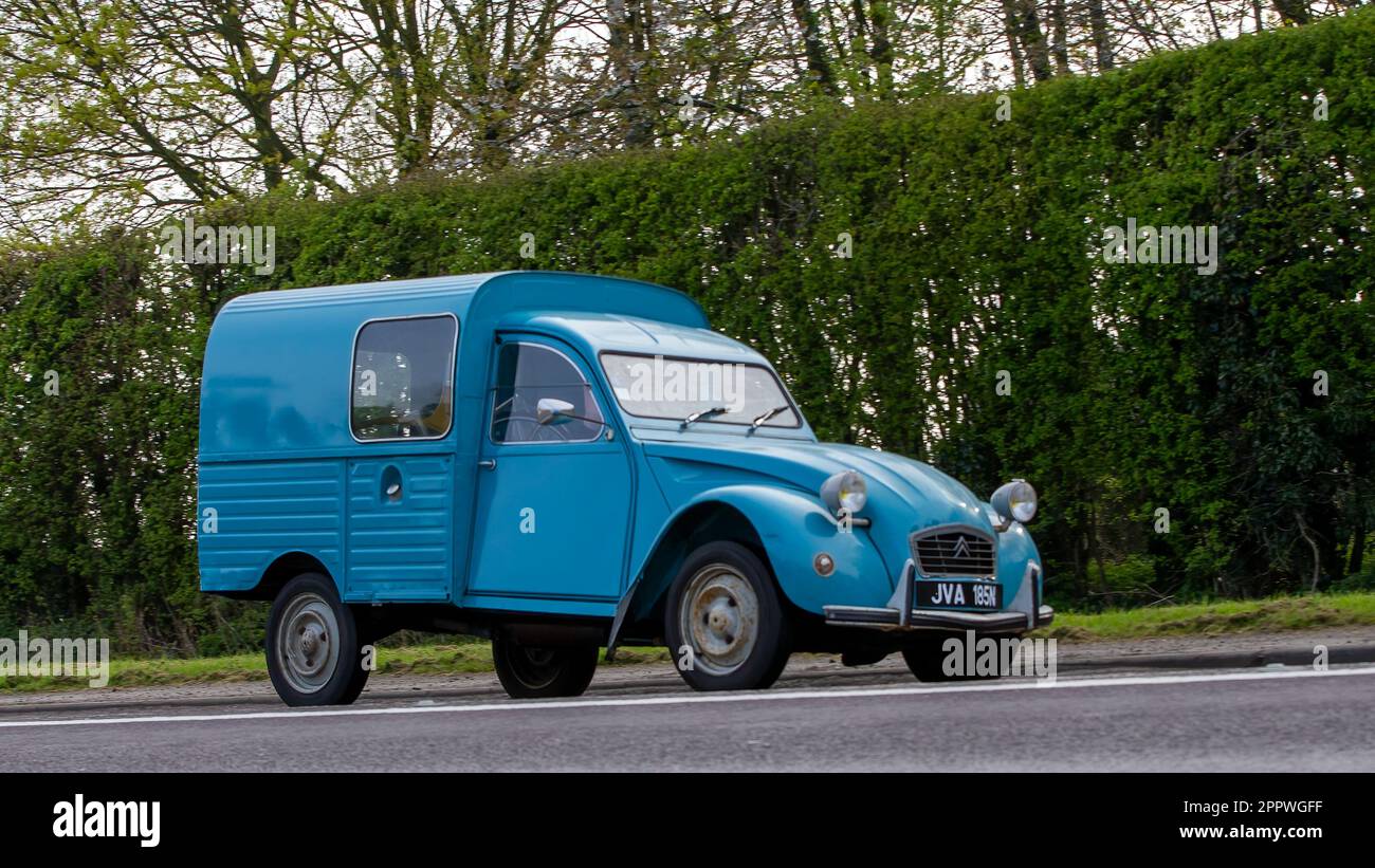 Bicester,Oxon,UK - April 23rd 2023. 1974 blue CITROEN 2CV van travelling on an English country road Stock Photo