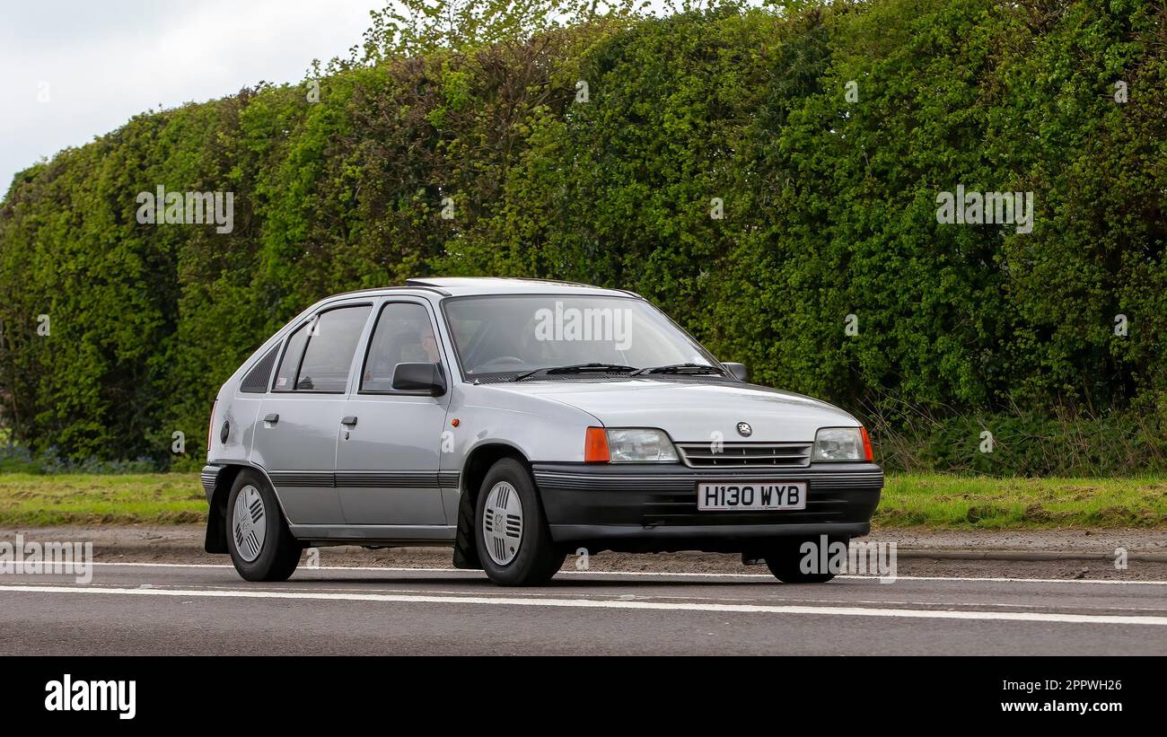 Bicester,Oxon,UK - April 23rd 2023. 1991 silver Vauxhall Astra car travelling on an English country road Stock Photo