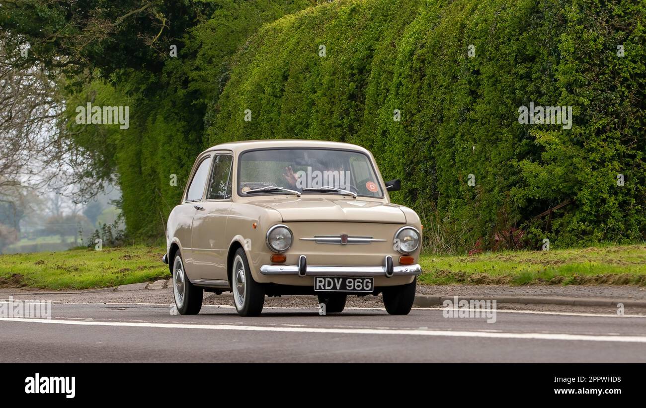Bicester,Oxon,UK - April 23rd 2023. 1969 FIAT 850 car travelling on an English country road Stock Photo