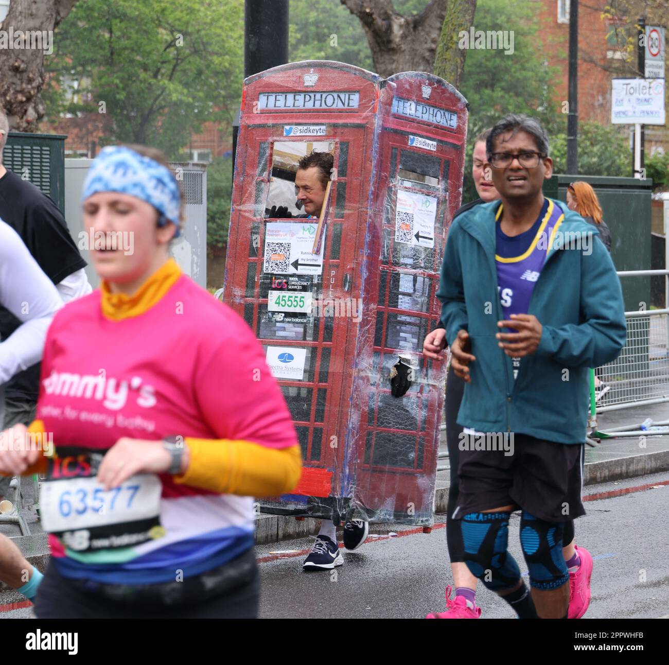 pic shows: London Marathon 2023 Wait that Telephone Box is moving ...